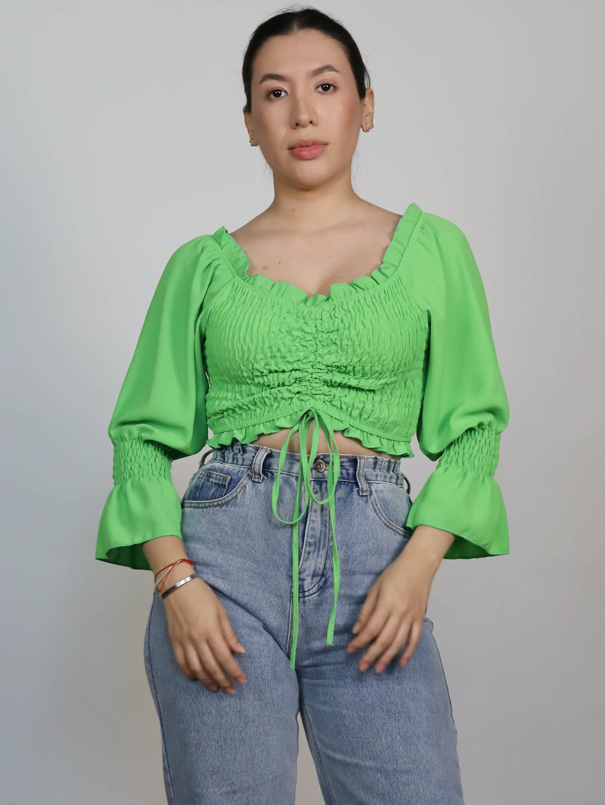 Top verde elastico off shoulder