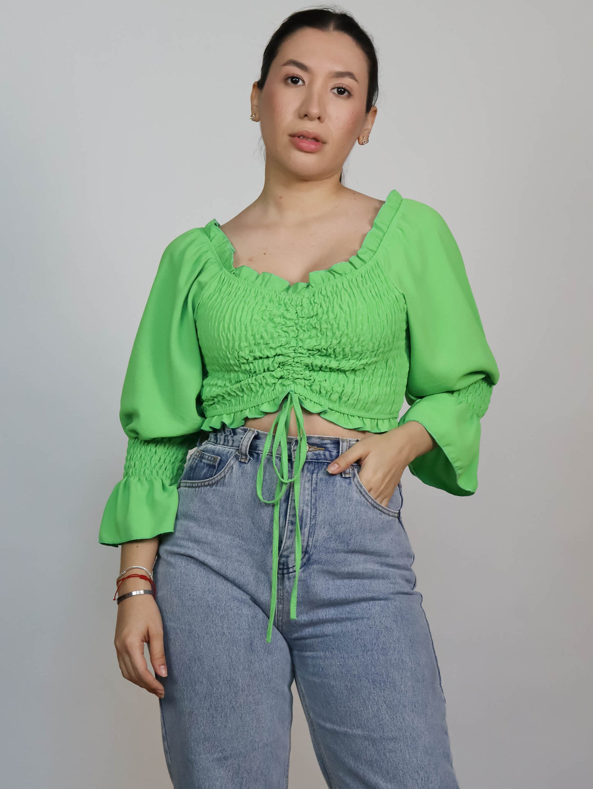 Top verde elastico off shoulder