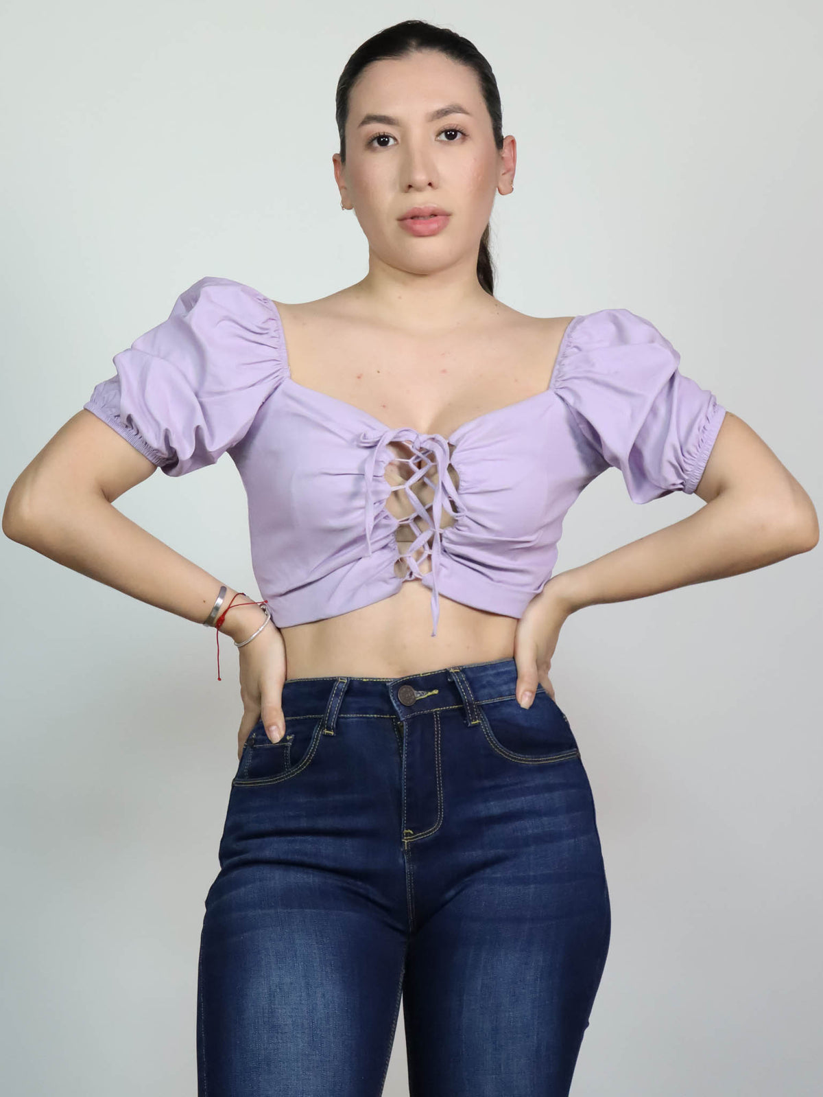 Top lila listón en pecho