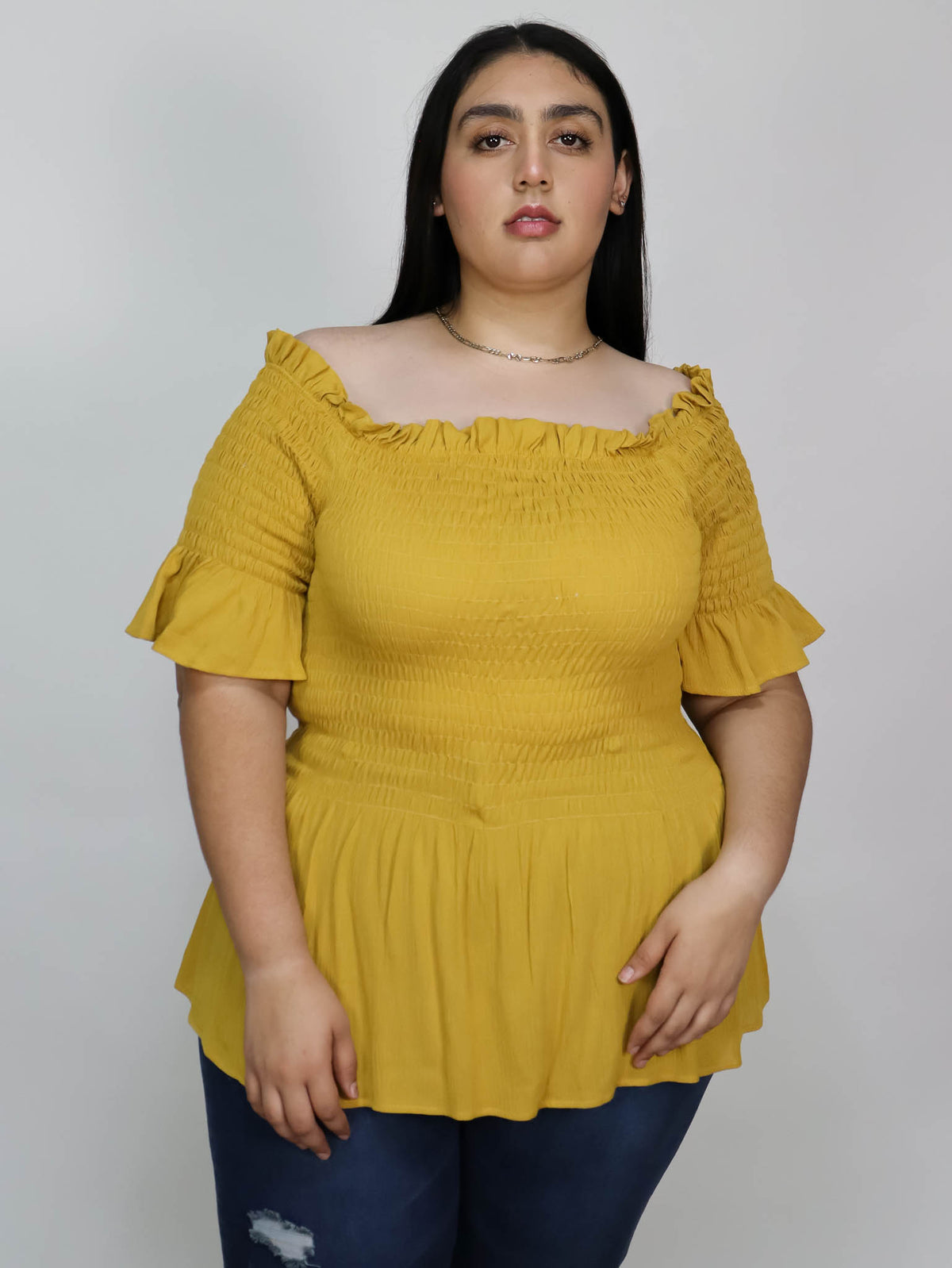 Blusa off shoulder extra