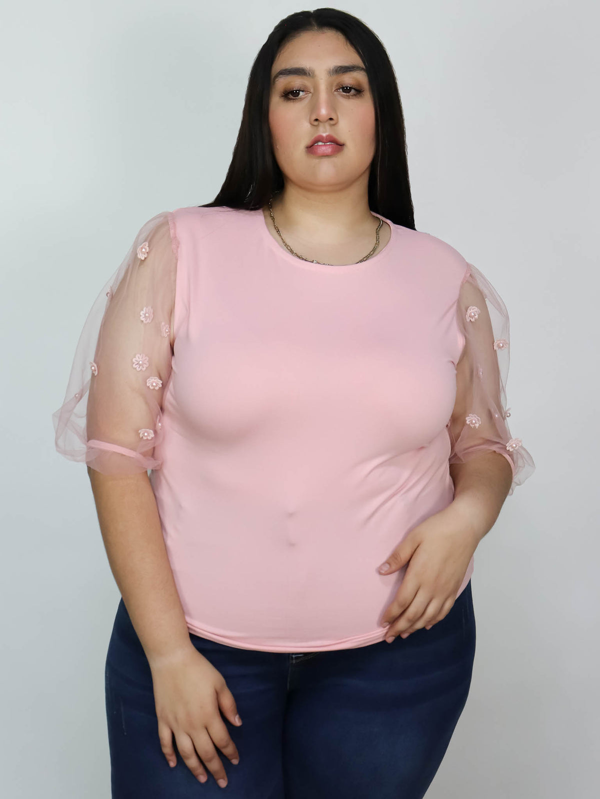 Blusa rosa detalles de flores