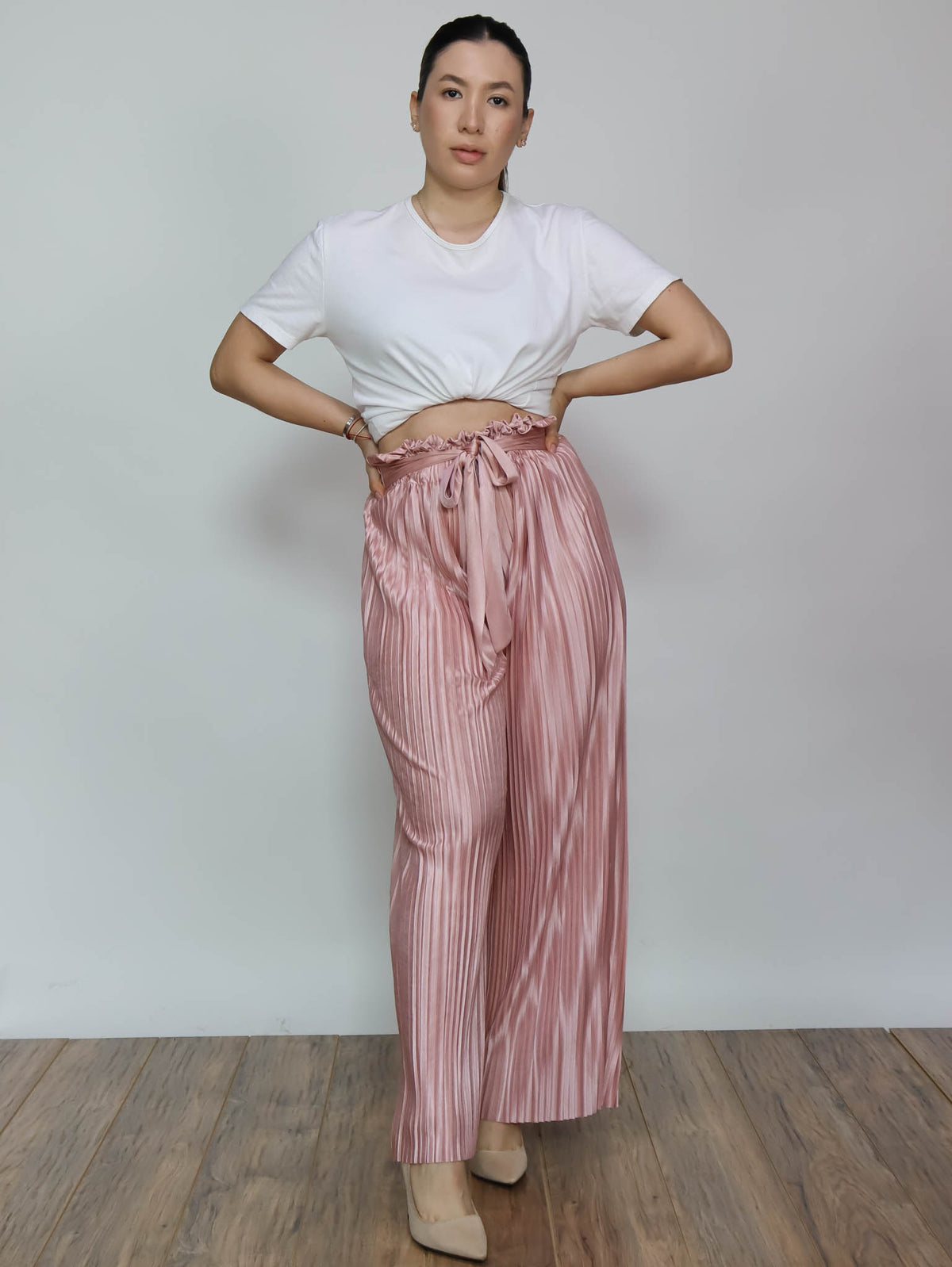 Pantalón rosa plisado