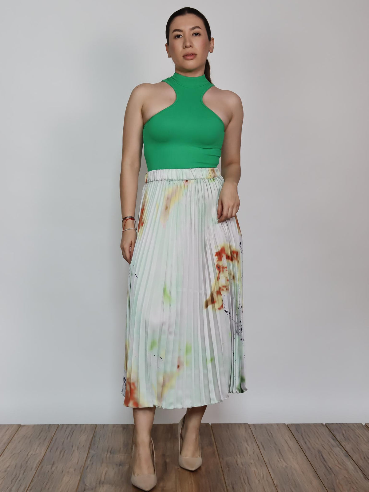 Falda midi tableada manchas