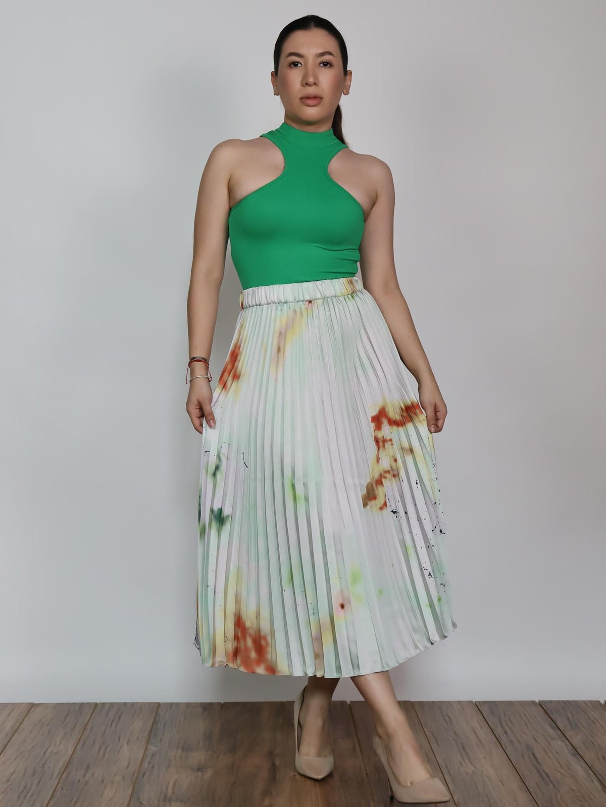 Falda midi tableada manchas