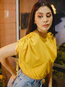 Blusa corta con elástico