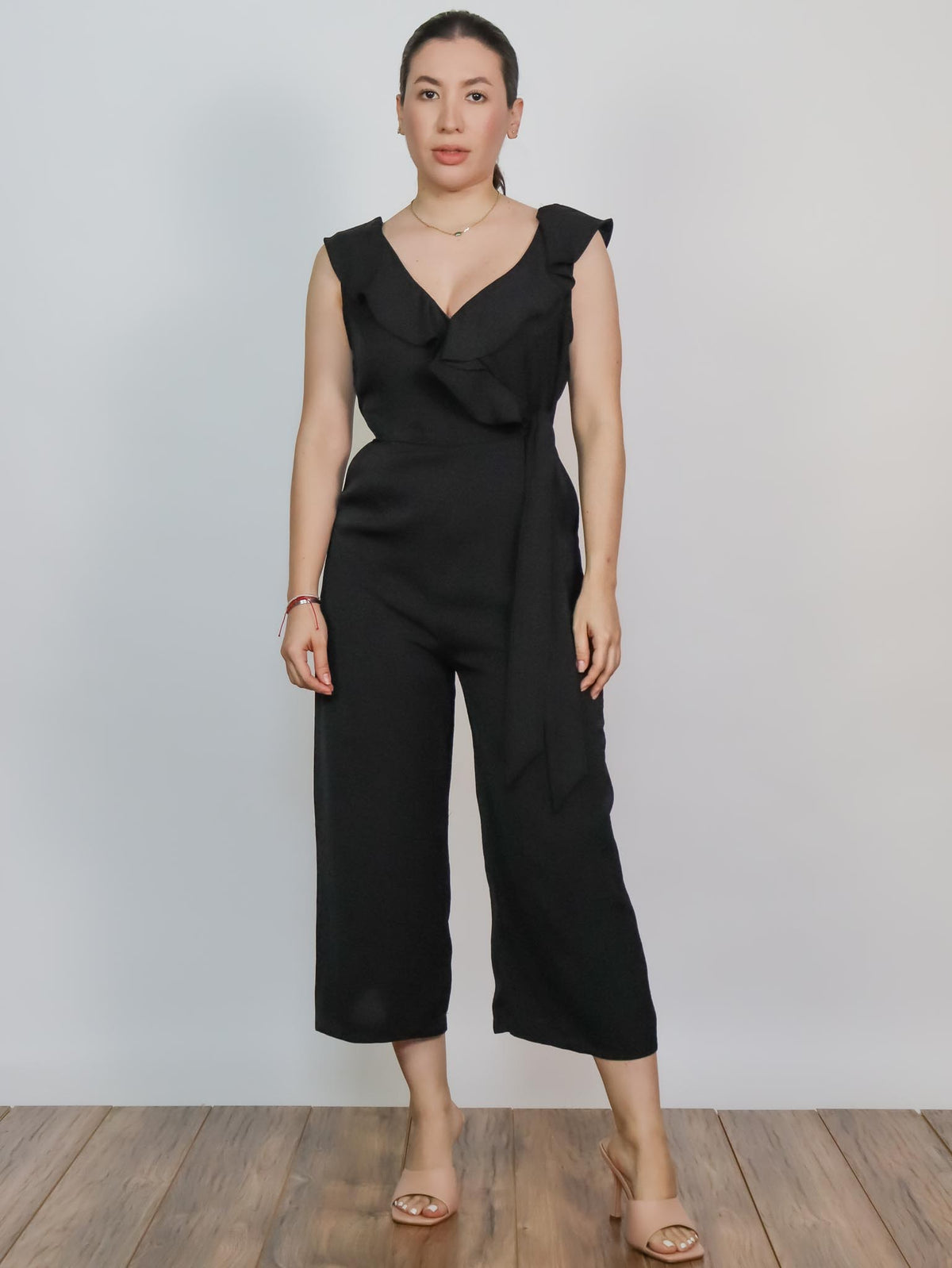 Jumper negro con olanes