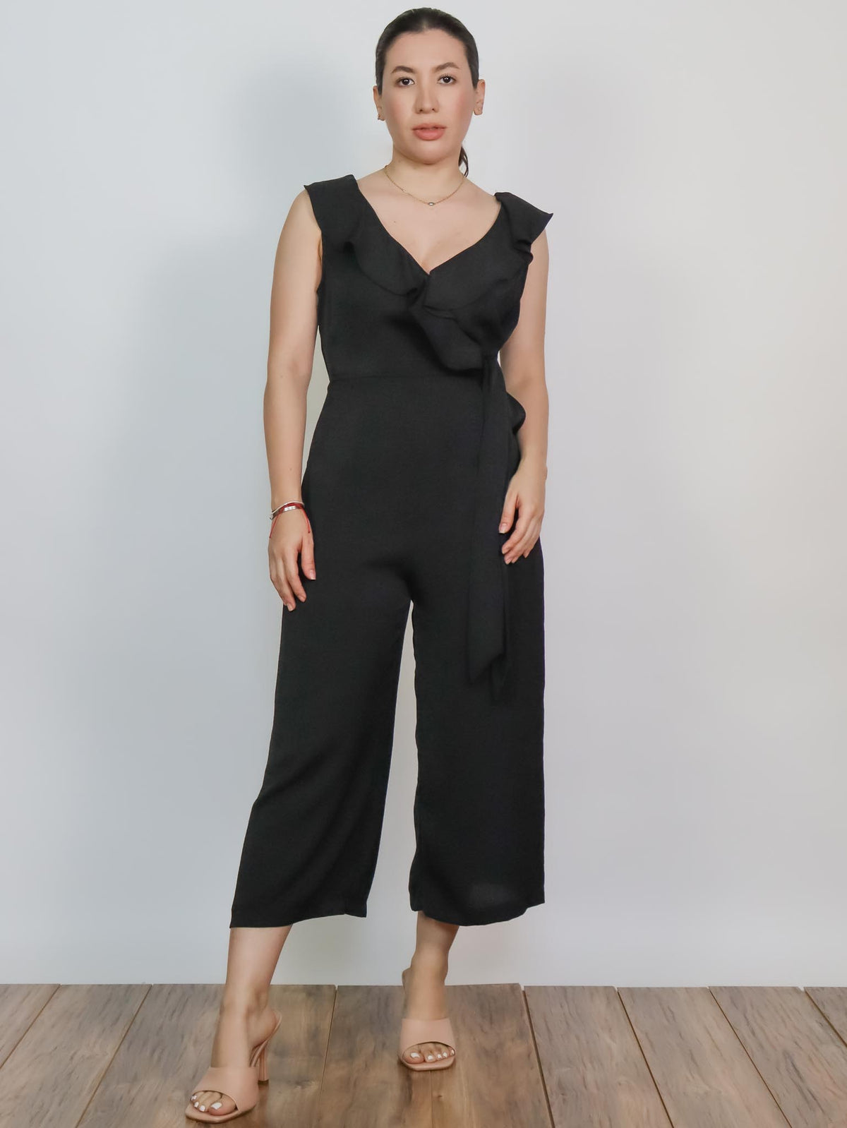Jumper negro con olanes
